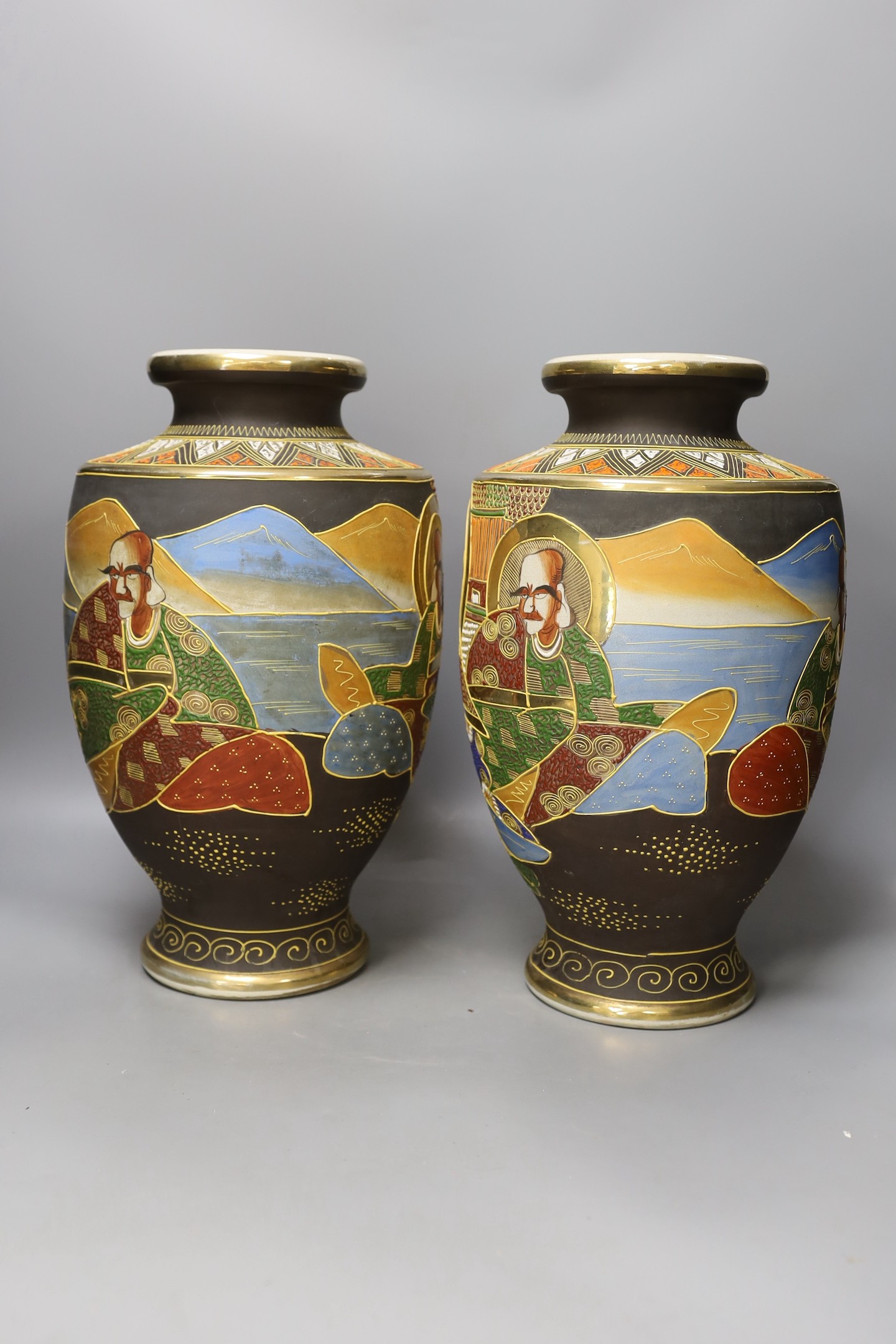 A pair of painted Japanese vases, marked to base - 36.5cm tall